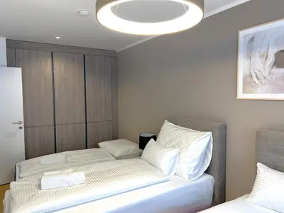 Ein Bett oder Betten in einem Zimmer der Unterkunft Free Parking - City Pulse Apartments at U6-Metro Vienna