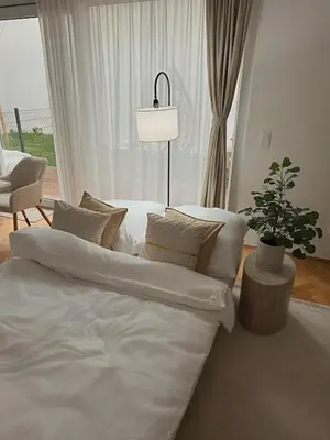 Ein Bett oder Betten in einem Zimmer der Unterkunft Dreamy Garden Residence