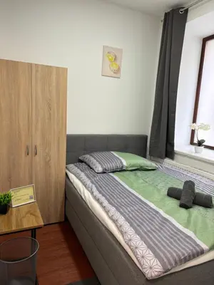 Ein Bett oder Betten in einem Zimmer der Unterkunft ANDA CITY ROOMs