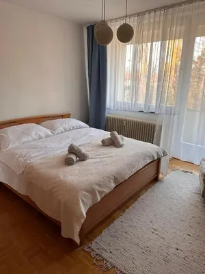 Ein Bett oder Betten in einem Zimmer der Unterkunft Green paradise near Vienna 3 room and balcony