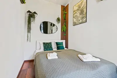 Ein Bett oder Betten in einem Zimmer der Unterkunft Jungle Apartment Vienna
