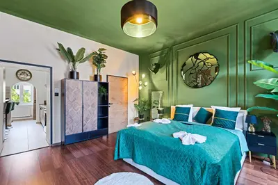 Ein Bett oder Betten in einem Zimmer der Unterkunft Jungle Apartment Vienna