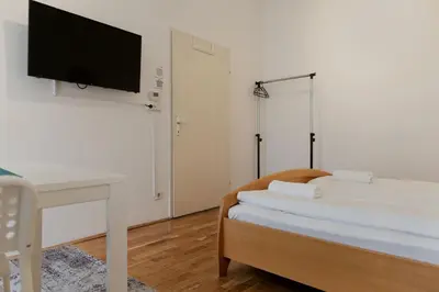 Ein Bett oder Betten in einem Zimmer der Unterkunft Cozy & Elegant 3BR Residence Near Downtown