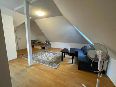 Ein Sitzbereich in der Unterkunft Zum Shambhala