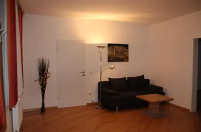 Ein Sitzbereich in der Unterkunft Zum Shambhala