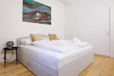 Ein Bett oder Betten in einem Zimmer der Unterkunft Belvedere City Apartment