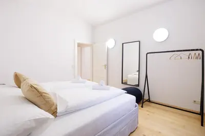 Ein Bett oder Betten in einem Zimmer der Unterkunft Belvedere City Apartment