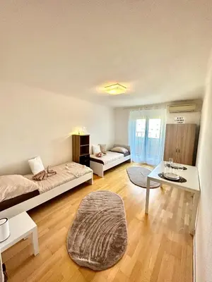 Ein Bett oder Betten in einem Zimmer der Unterkunft Quiet Apartment near Airport Vienna #2