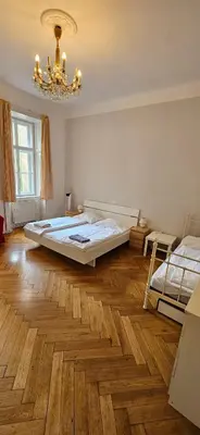 Ein Bett oder Betten in einem Zimmer der Unterkunft Sobieski Sigmund Freud Apartment