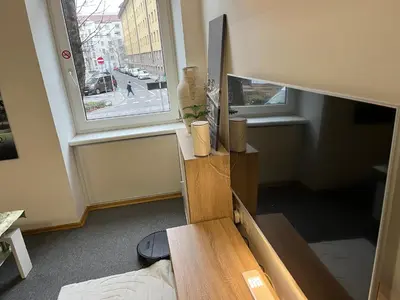 Ein Sitzbereich in der Unterkunft Gutbau com, Whole Apartment 4u, Self-Check-in, Top-Location, Underground & Shops under window, 3-5min Walking to Swimming & footbal Stadion, Wake-up in sunshine