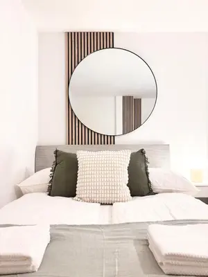 Ein Bett oder Betten in einem Zimmer der Unterkunft Takara Living 24 mit Terrasse