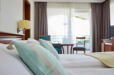 Ein Bett oder Betten in einem Zimmer der Unterkunft Seewirt & Haus Attila
