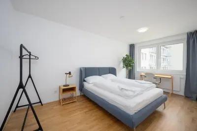 Ein Bett oder Betten in einem Zimmer der Unterkunft HIRSCH Apartments