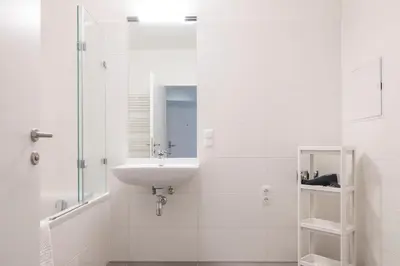 Ein Badezimmer in der Unterkunft HIRSCH Apartments