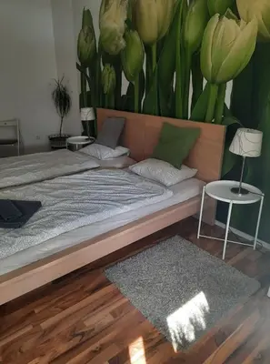 Ein Bett oder Betten in einem Zimmer der Unterkunft Das Tulpen Apartment