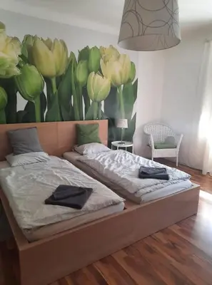 Ein Bett oder Betten in einem Zimmer der Unterkunft Das Tulpen Apartment