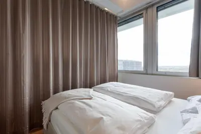 Ein Bett oder Betten in einem Zimmer der Unterkunft Skyline City Loft