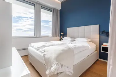 Ein Bett oder Betten in einem Zimmer der Unterkunft Skyline City Loft