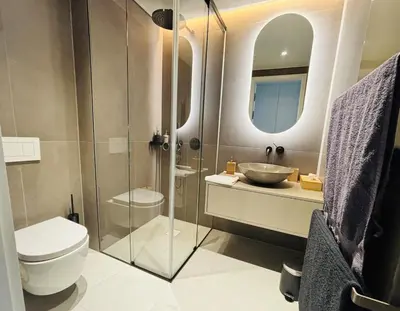 Ein Badezimmer in der Unterkunft Modern apartment overlooking the skyline & Danube