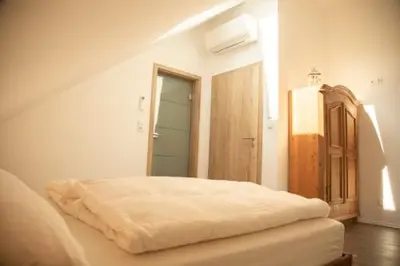Ein Bett oder Betten in einem Zimmer der Unterkunft Frühstückspension Das Einser