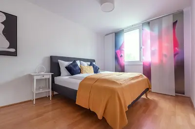Ein Bett oder Betten in einem Zimmer der Unterkunft Between Old Danube and Danube Center - new, quiet and modern