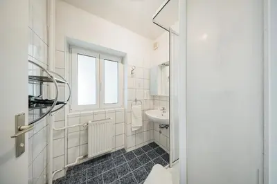 Ein Badezimmer in der Unterkunft Vienna West Rooms