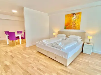 Ein Bett oder Betten in einem Zimmer der Unterkunft Steiner Residences Mödling