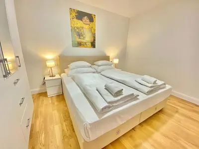 Ein Bett oder Betten in einem Zimmer der Unterkunft Steiner Residences Mödling