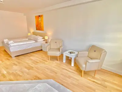 Ein Bett oder Betten in einem Zimmer der Unterkunft Steiner Residences Mödling