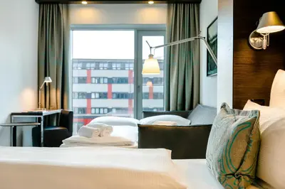 Ein Bett oder Betten in einem Zimmer der Unterkunft Motel One Wien-Hauptbahnhof