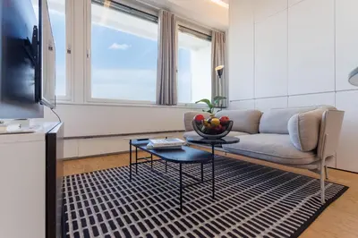 Ein Sitzbereich in der Unterkunft Skyline View Vienna - Gym - Parken - Supermarkt - Restaurant - Self Check in