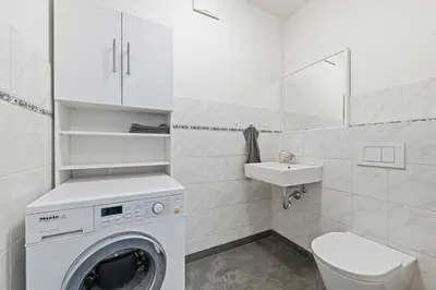Ein Badezimmer in der Unterkunft 1 Bedroom, in the city center, Garage, Terrace