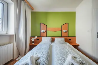 Ein Bett oder Betten in einem Zimmer der Unterkunft Vienna West Business Inn