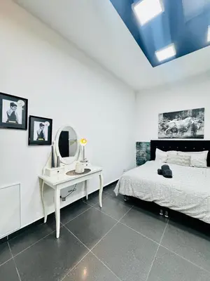 Ein Bett oder Betten in einem Zimmer der Unterkunft Studio Apartment For 3 People, 15 Minutes to Rathausplatz