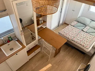 Ein Bett oder Betten in einem Zimmer der Unterkunft Tiny House am See