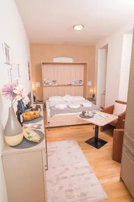 Ein Bett oder Betten in einem Zimmer der Unterkunft Tiny Hideaway