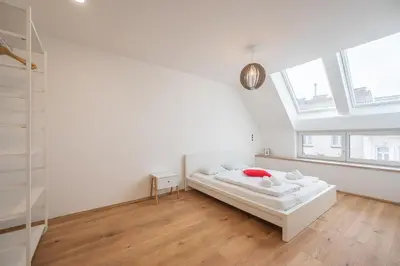 Ein Bett oder Betten in einem Zimmer der Unterkunft FeelHome-Zentrum-6 Gäste-WiFi