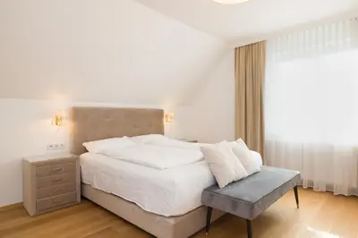 Ein Bett oder Betten in einem Zimmer der Unterkunft Pension Garden
