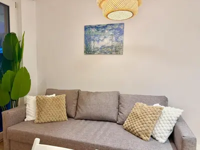 Ein Sitzbereich in der Unterkunft Premium Apartment mit Garten nähe SCS