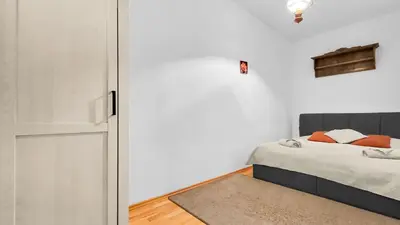 Ein Bett oder Betten in einem Zimmer der Unterkunft Adalbert Apartments