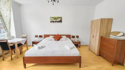 Ein Bett oder Betten in einem Zimmer der Unterkunft Adalbert Apartments