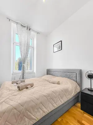 Ein Bett oder Betten in einem Zimmer der Unterkunft Nordwestbahn Apartments