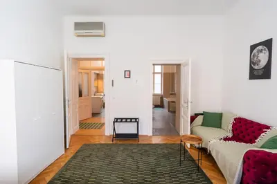 Ein Bett oder Betten in einem Zimmer der Unterkunft L'Art de Vivre