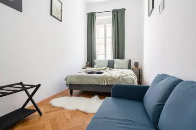 Ein Bett oder Betten in einem Zimmer der Unterkunft L'Art de Vivre