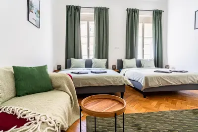 Ein Bett oder Betten in einem Zimmer der Unterkunft L'Art de Vivre