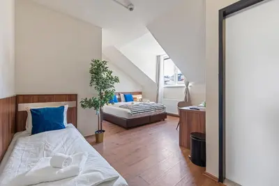 Ein Bett oder Betten in einem Zimmer der Unterkunft K22 Smart Rooms