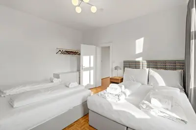 Ein Bett oder Betten in einem Zimmer der Unterkunft Cozy Living Apartment 
