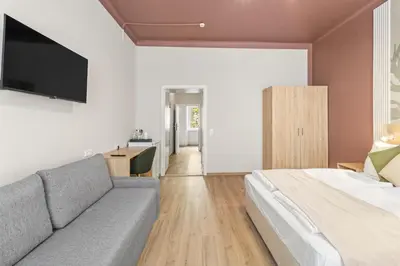 Ein Bett oder Betten in einem Zimmer der Unterkunft Dependance Rooms I 6 Mins to U6 Alser Straße I Self Check In
