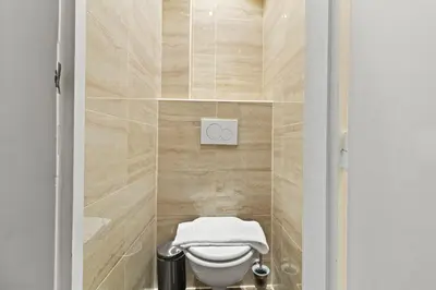 Ein Badezimmer in der Unterkunft Dependance Rooms I 6 Mins to U6 Alser Straße I Self Check In