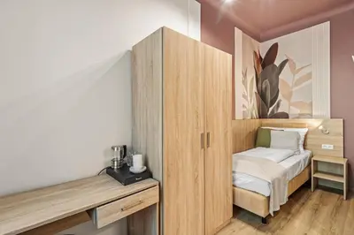 Ein Bett oder Betten in einem Zimmer der Unterkunft Dependance Rooms I 6 Mins to U6 Alser Straße I Self Check In